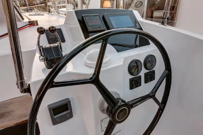 Escape Yacht Photos Pics Helm station of 2016 Nautitech 40 Open catamaran with navigation instruments.