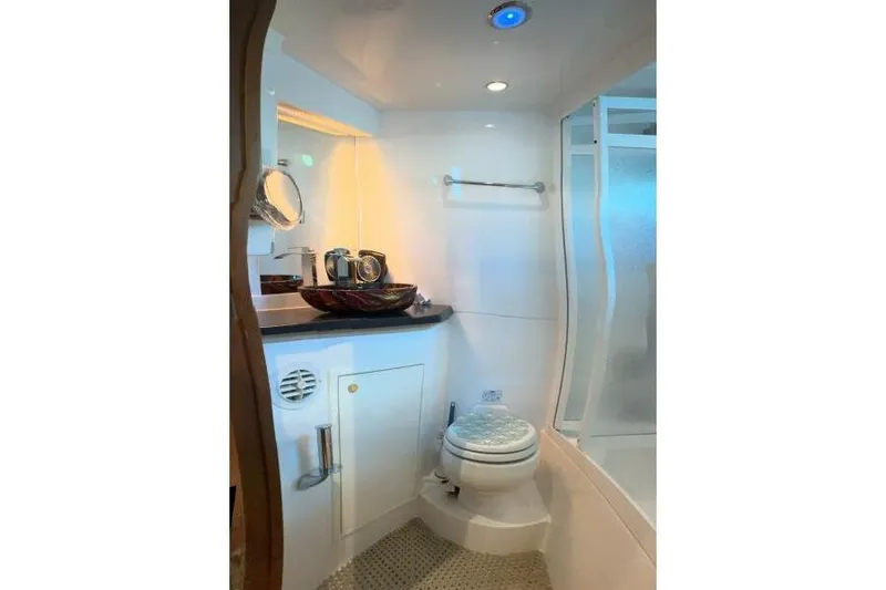 On Your Mark Yacht Photos Pics Luxurious bathroom in 2005 Jefferson Motoryacht with modern fixtures and elegant design.