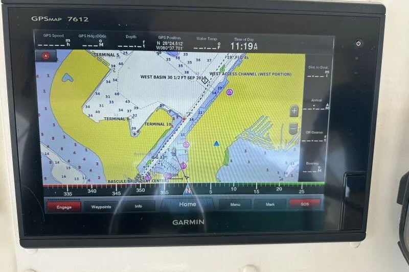 On Your Mark Yacht Photos Pics Garmin GPS display on 2005 Jefferson Motoryacht showing navigation map and coordinates.