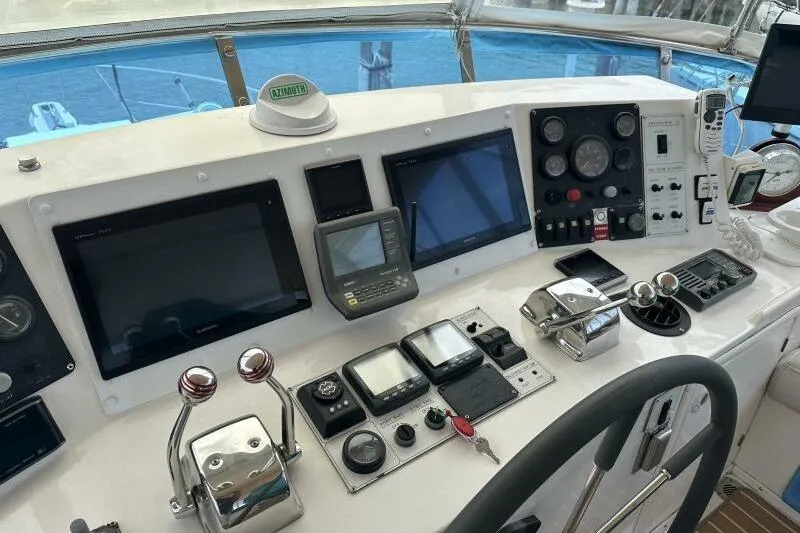 On Your Mark Yacht Photos Pics Control panel of a 2005 Jefferson Motoryacht with navigation and communication equipment.