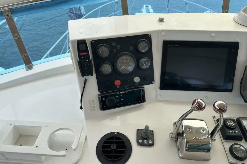 On Your Mark Yacht Photos Pics Control panel of a 2005 Jefferson Motoryacht with gauges and navigation equipment.