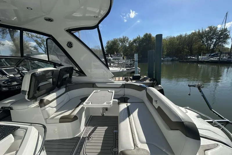  Yacht Photos Pics Luxurious 2015 Monterey 355 Sport Yacht interior with sleek seating and scenic marina view.