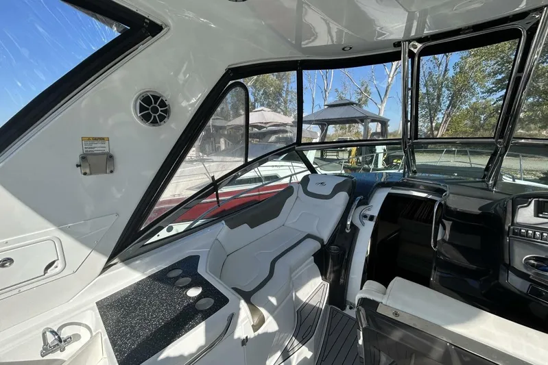  Yacht Photos Pics Interior of a 2015 Monterey 355 Sport Yacht with sleek seating and modern design.