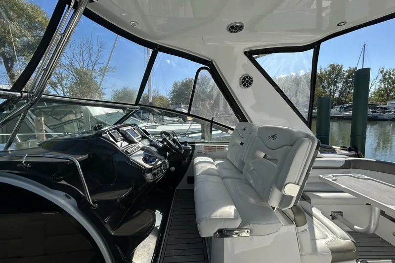  Yacht Photos Pics 2015 Monterey 355 Sport Yacht interior with sleek dashboard and comfortable seating.