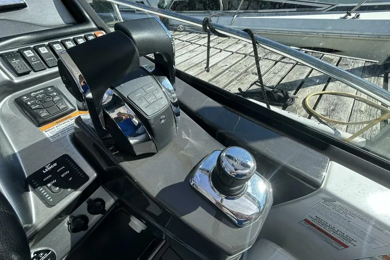  Yacht Photos Pics Control panel of a 2015 Monterey 355 Sport Yacht with throttle and joystick.