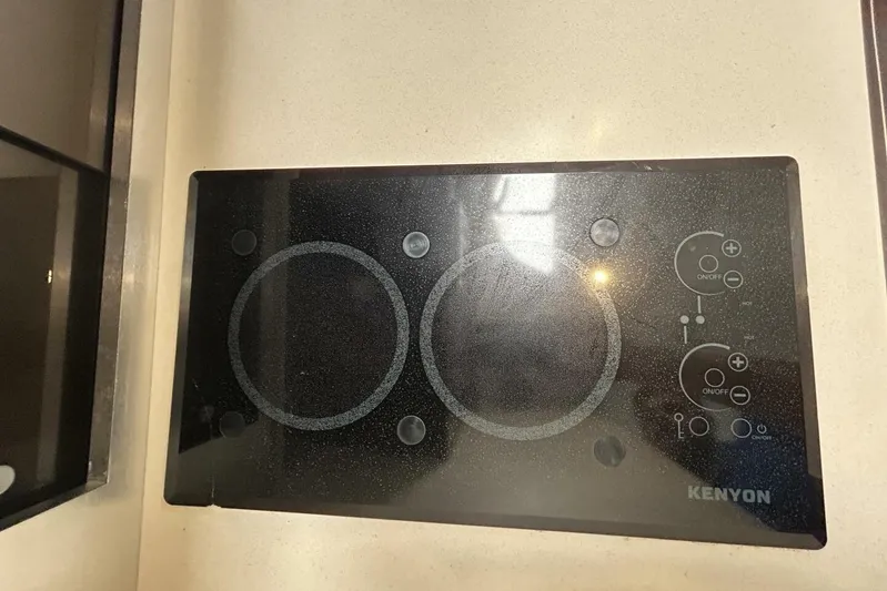  Yacht Photos Pics Kenyon electric cooktop in 2015 Monterey 355 Sport Yacht kitchen area.