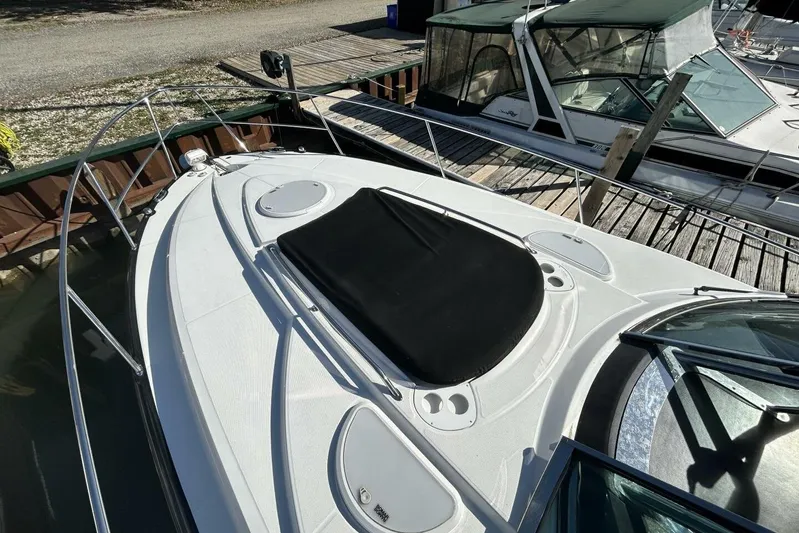  Yacht Photos Pics 2015 Monterey 355 Sport Yacht docked, featuring sleek design and spacious deck.