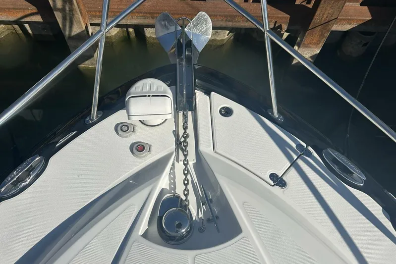  Yacht Photos Pics 2015 Monterey 355 Sport Yacht bow with anchor and chain in marina.