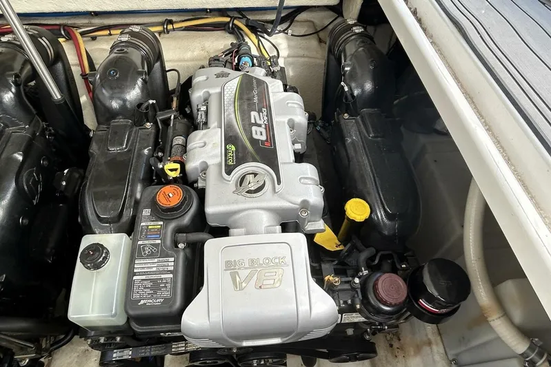  Yacht Photos Pics Engine compartment of a 2015 Monterey 355 Sport Yacht, featuring a powerful V8 engine.