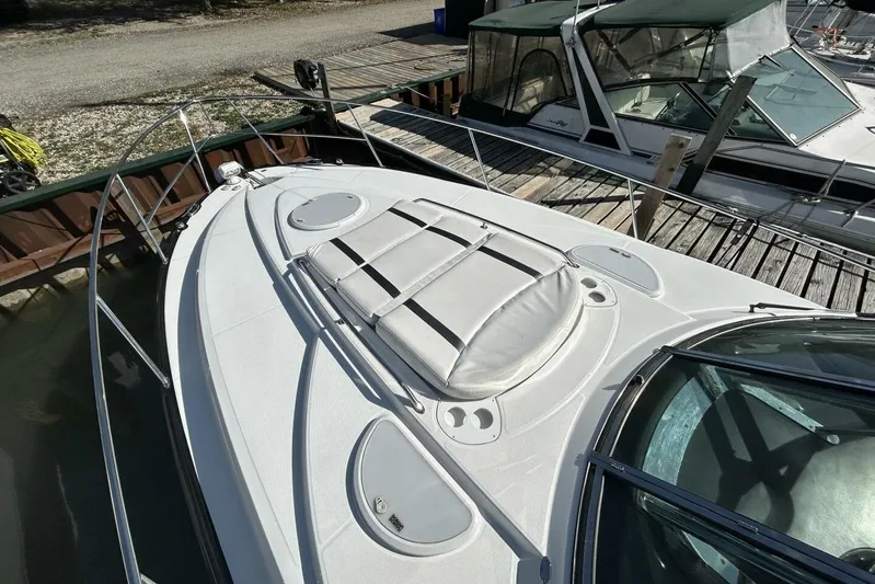  Yacht Photos Pics 2015 Monterey 355 Sport Yacht docked, showcasing sleek design and spacious deck.