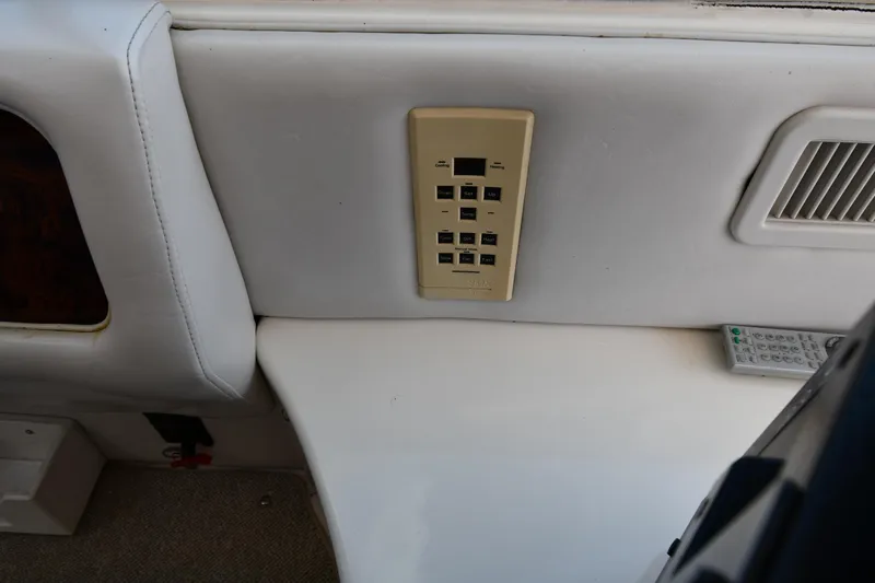  Yacht Photos Pics Control panel and remote on 1995 Sea Ray 630 Sundancer yacht interior.