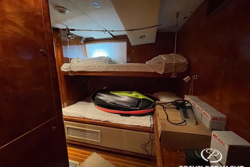  Yacht Photos Pics Interior cabin of 2006 Monte Fino 76 yacht with bunk beds and equipment.