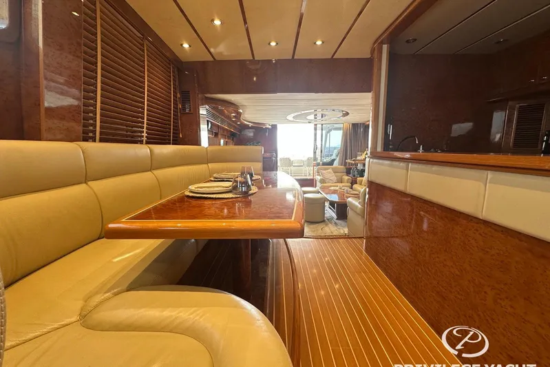  Yacht Photos Pics Luxurious interior of a 2006 Monte Fino 76 yacht with elegant dining area.