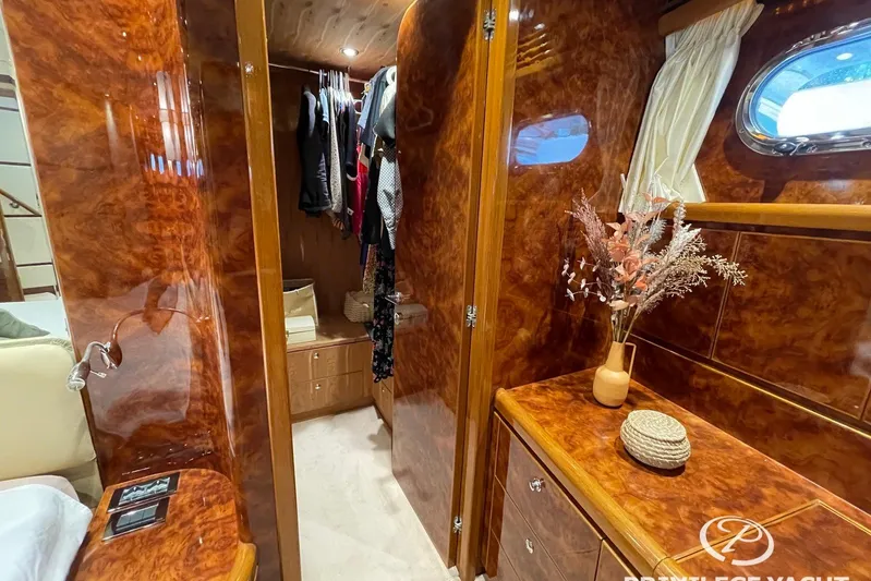  Yacht Photos Pics Luxurious Monte Fino 76 yacht interior, featuring elegant wood finishes and stylish decor, 2006 model.