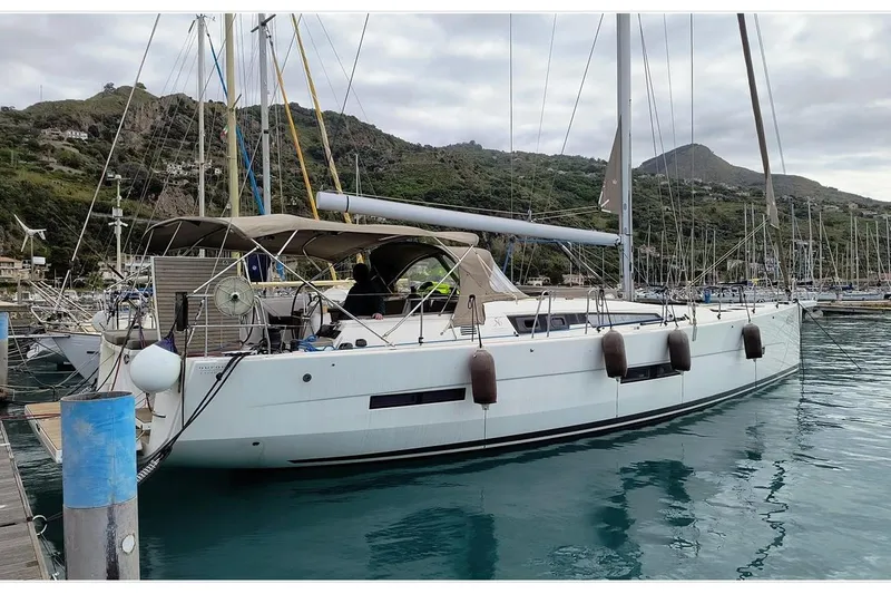  Yacht Photos Pics 2017 Dufour Exclusive 56 yacht docked in a scenic marina.