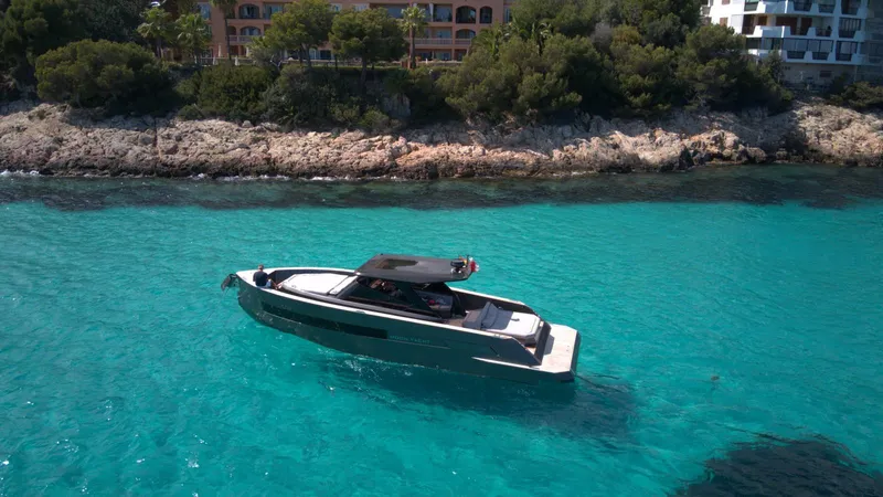 New 2025 Moon 45 Sports Line Yacht Photos Pics Luxury Moon 45 Sportsline yacht cruising in clear turquoise waters, 2025 model.