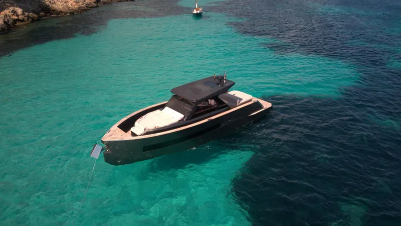 New 2025 Moon 45 Sports Line Yacht Photos Pics Luxury Moon 45 Sportsline yacht cruising in clear turquoise waters, 2025 model.