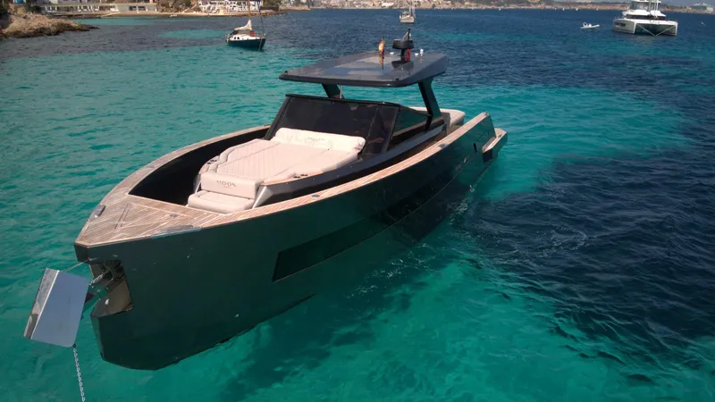 New 2025 Moon 45 Sports Line Yacht Photos Pics Luxurious 2025 Moon 45 Sportsline yacht on clear turquoise waters.