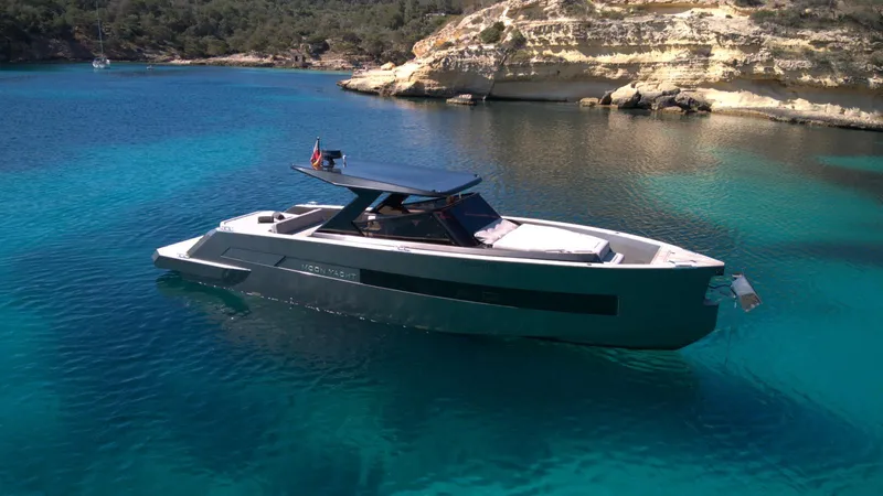 New 2025 Moon 45 Sports Line Yacht Photos Pics Luxury Moon 45 Sportsline yacht, 2025 model, anchored in clear turquoise waters.