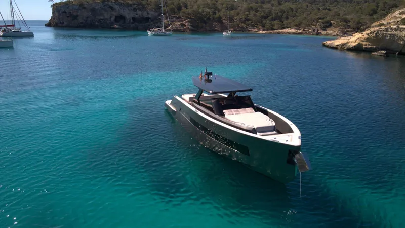 New 2025 Moon 45 Sports Line Yacht Photos Pics Luxury yacht "Moon 45 Sportsline" 2025 in serene turquoise waters.