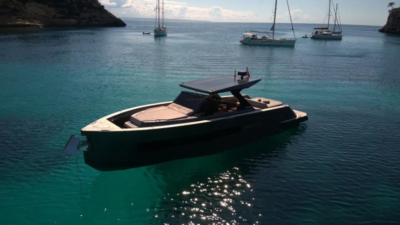 New 2025 Moon 45 Sports Line Yacht Photos Pics Luxurious 2025 Moon 45 Sportsline yacht anchored in serene turquoise waters.