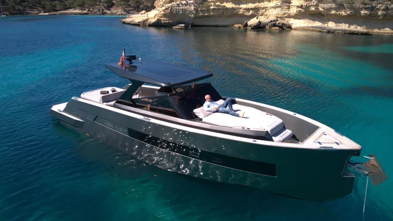 New 2025 Moon 45 Sports Line Yacht Photos Pics Luxury Moon 45 Sportsline yacht, 2025 model, anchored in clear turquoise waters.