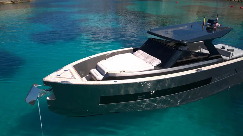 New 2025 Moon 45 Sports Line Yacht Photos Pics Luxury Moon 45 Sportsline yacht, 2025 model, anchored in clear turquoise waters.