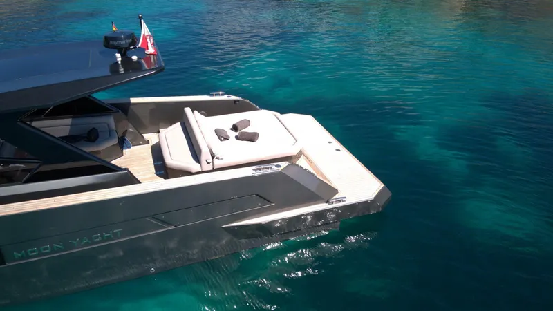 New 2025 Moon 45 Sports Line Yacht Photos Pics Luxury Moon 45 Sportsline yacht, 2025 model, on clear turquoise water.