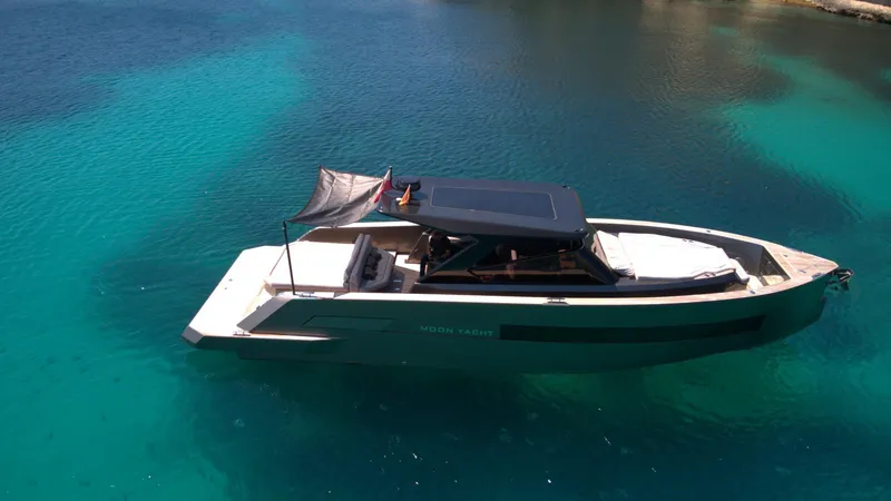 New 2025 Moon 45 Sports Line Yacht Photos Pics Luxury Moon 45 Sportsline yacht, 2025 model, cruising on clear turquoise waters.