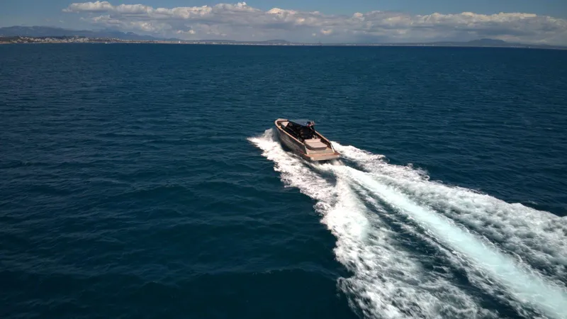 New 2025 Moon 45 Sports Line Yacht Photos Pics Aerial view of 2025 Moon 45 Sportsline yacht cruising on open sea.
