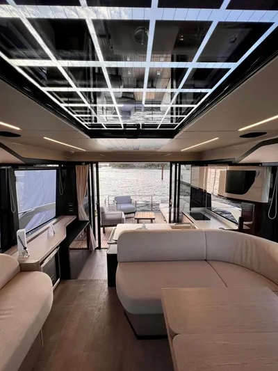  Yacht Photos Pics Luxurious interior of 2025 Absolute 48 Coupe yacht with modern design and waterfront view.