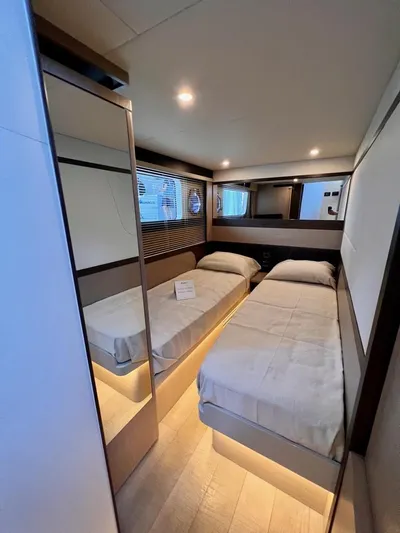  Yacht Photos Pics Interior of 2025 Absolute 48 Coupe yacht with twin beds and modern design.