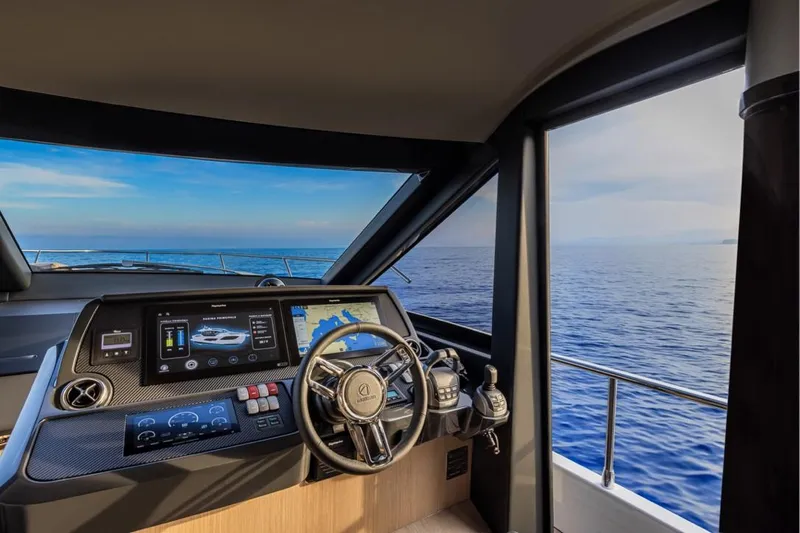  Yacht Photos Pics Helm of 2025 Absolute 48 Coupe yacht with ocean view.