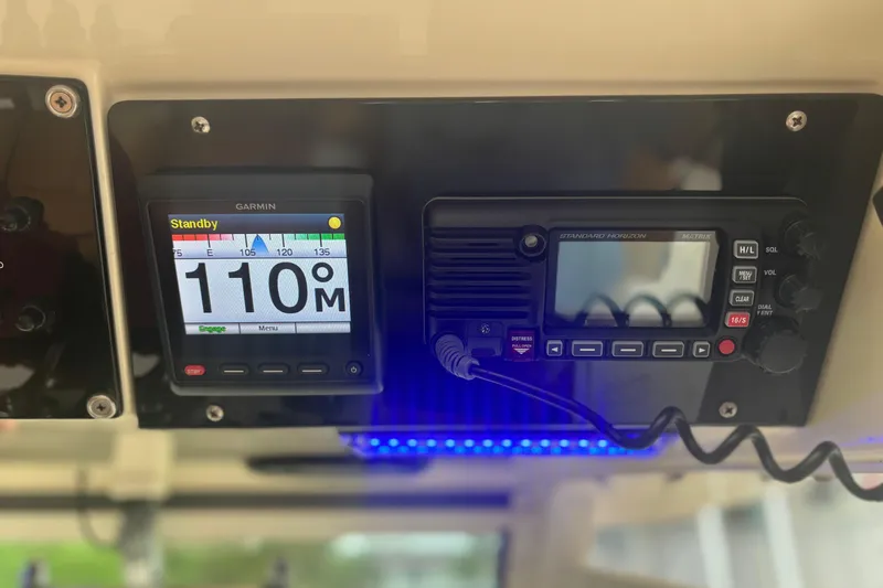  Yacht Photos Pics Garmin and Standard Horizon marine electronics on 2014 Scout 350 LXF boat dashboard.