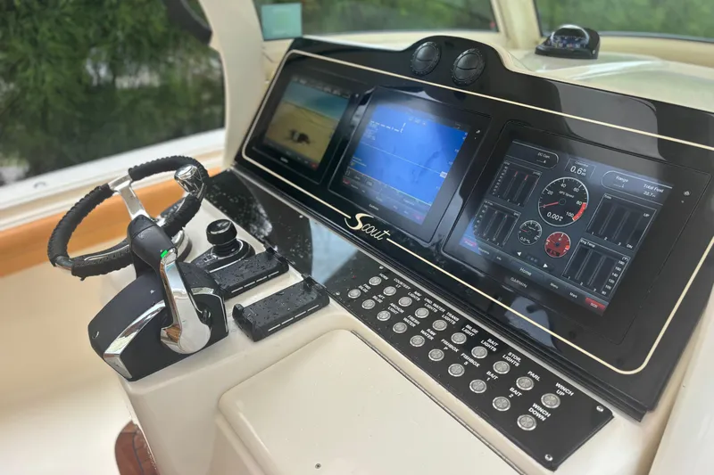  Yacht Photos Pics Control panel of a 2014 Scout 350 LXF boat with advanced navigation displays.