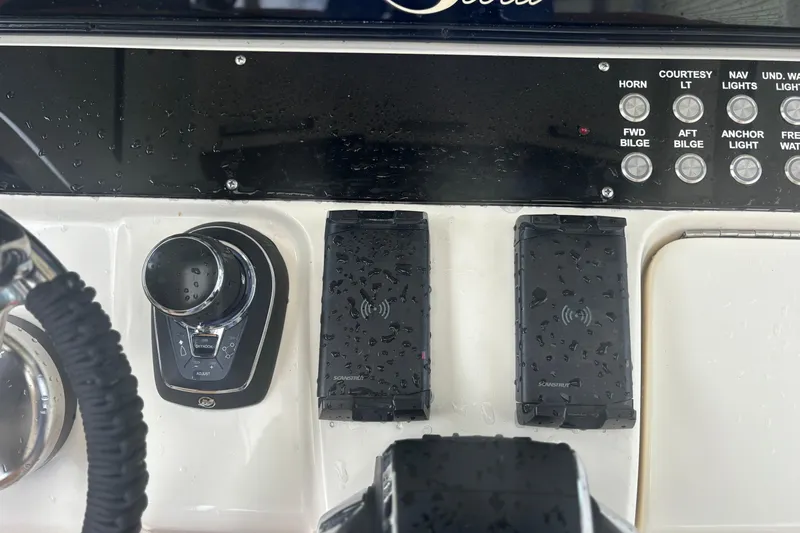  Yacht Photos Pics Control panel of a 2014 Scout 350 LXF boat with wet switches and controls.