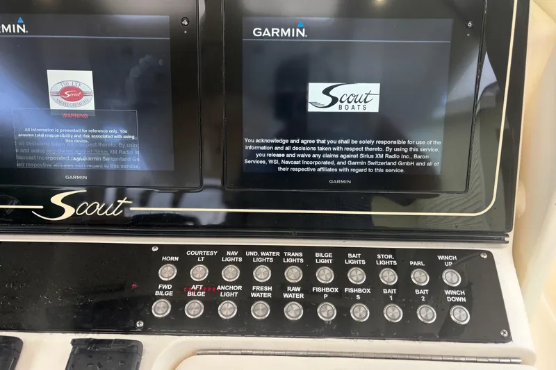  Yacht Photos Pics Control panel of a 2014 Scout 350 LXF boat with Garmin displays.