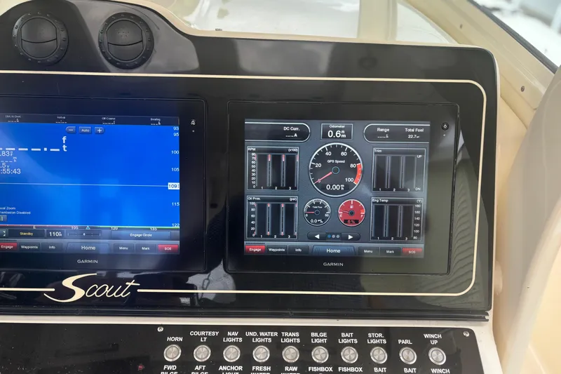  Yacht Photos Pics Dashboard of a 2014 Scout 350 LXF boat with Garmin navigation displays.