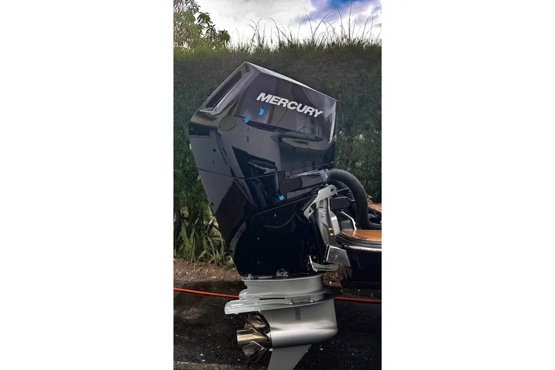  Yacht Photos Pics Mercury outboard motor on a 2014 Scout 350 LXF boat, side view.