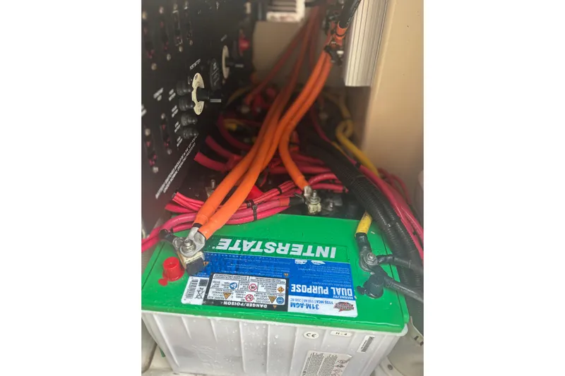  Yacht Photos Pics Battery compartment of 2014 Scout 350 LXF with wiring and Interstate battery.