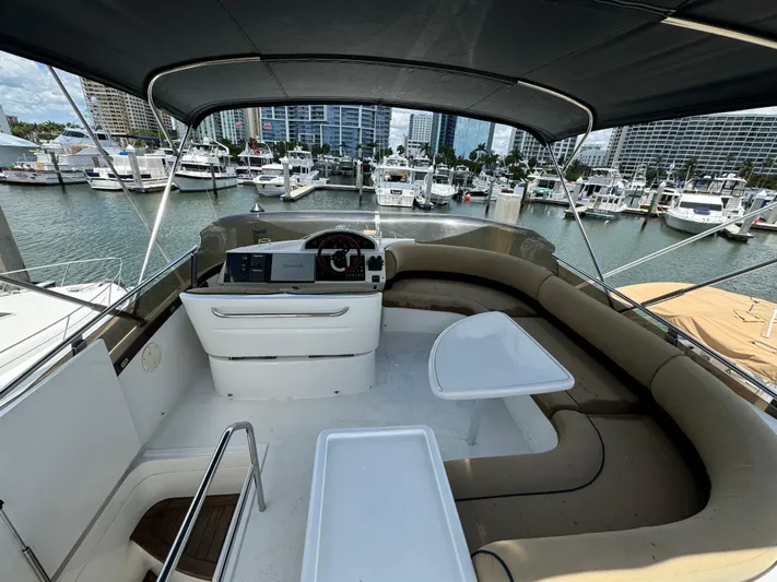 4 Aces Yacht Photos Pics Flybridge of 2001 Viking Princess 45 yacht docked at marina.