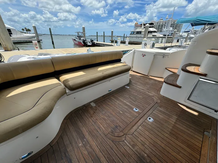 4 Aces Yacht Photos Pics Viking Princess 45 Flybridge 2001 yacht with spacious deck and marina view.