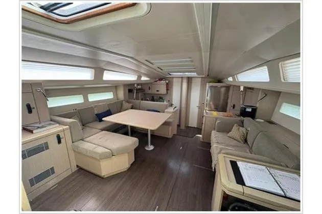  Yacht Photos Pics Luxurious interior of 2021 Jeanneau 60 yacht with spacious seating and modern design.