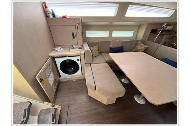  Yacht Photos Pics Interior of 2021 Jeanneau 60 yacht with modern seating and built-in washer.