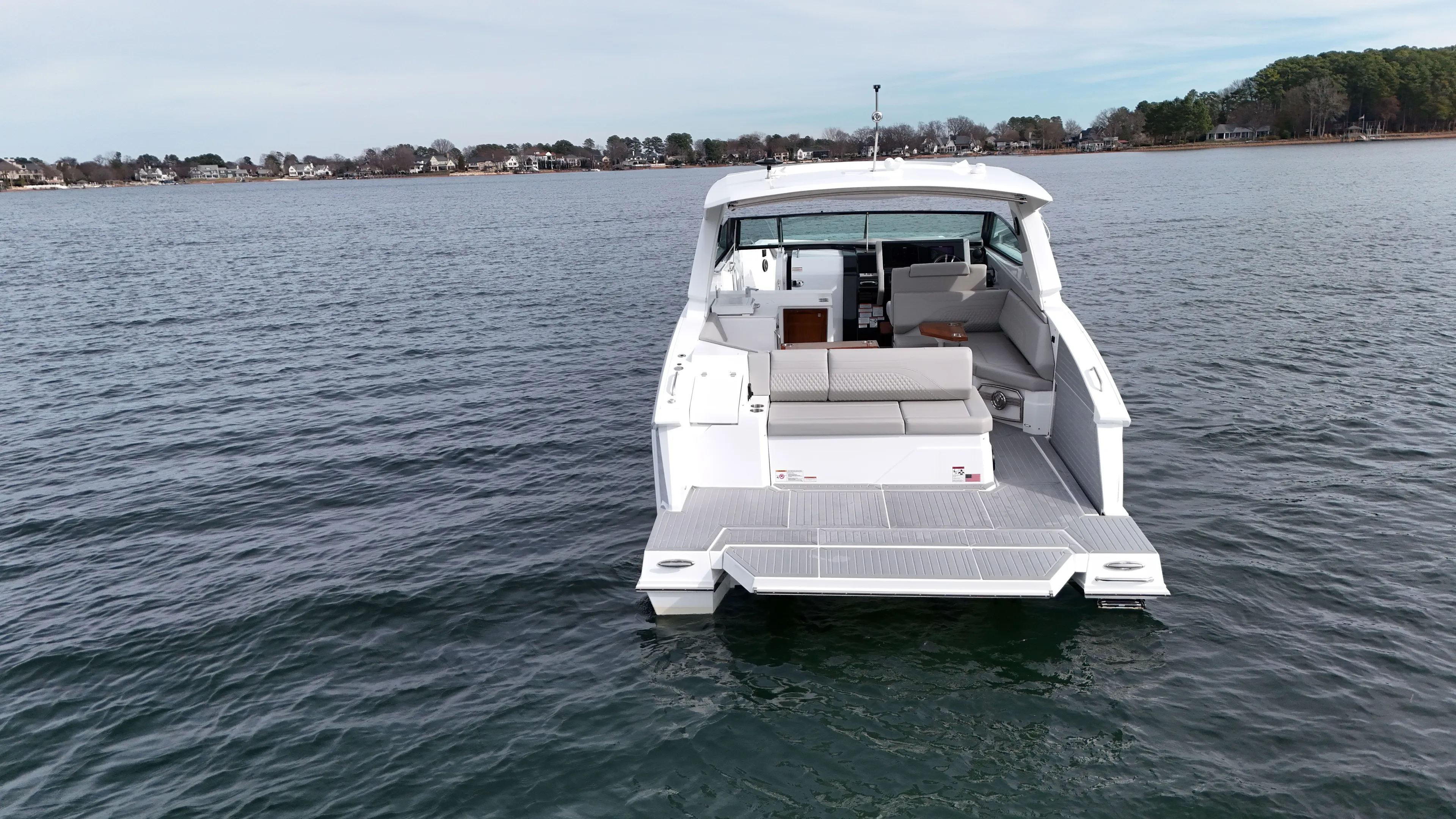  Yacht Photos Pics 2025 Cruisers Yachts 38 GLS on calm water.