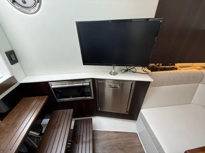  Yacht Photos Pics Interior of 2025 Cruisers Yachts 38 GLS with TV and microwave.