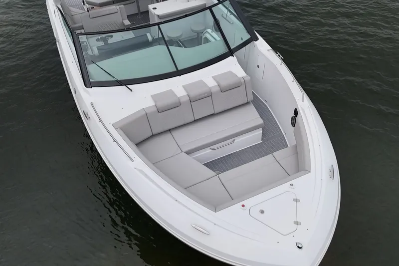  Yacht Photos Pics Luxurious 2025 Cruisers Yachts 38 GLS boat on calm water.