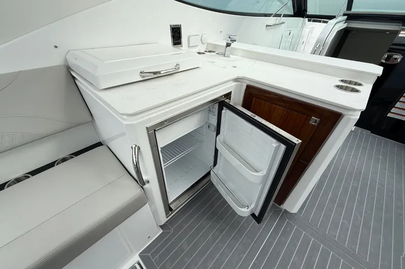  Yacht Photos Pics Galley on 2025 Cruisers Yachts 38 GLS with open refrigerator.