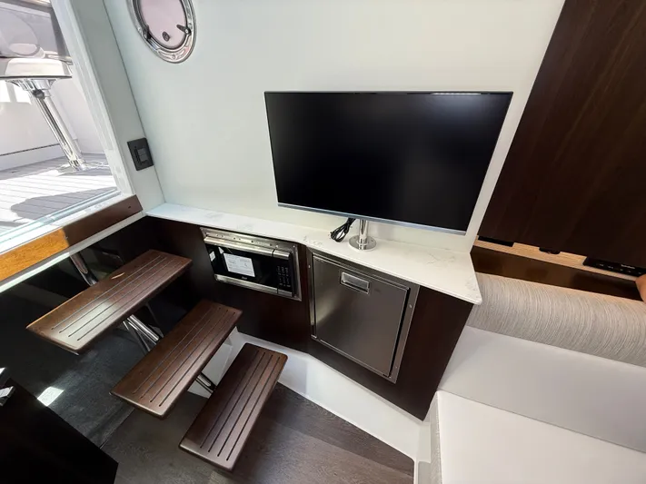  Yacht Photos Pics Interior of 2025 Cruisers Yachts 38 GLS with TV and microwave.