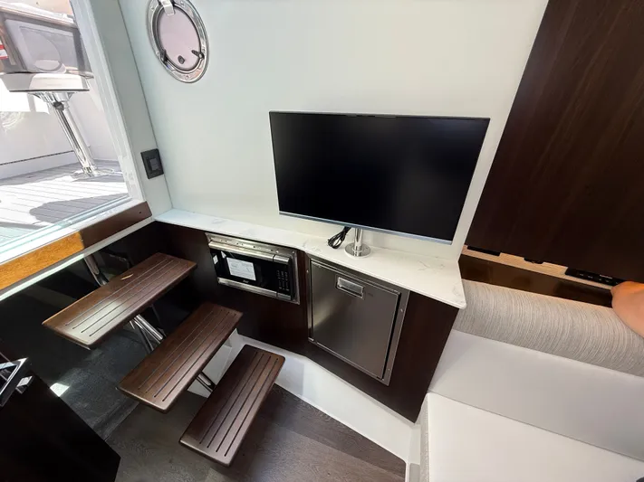 Yacht Photos Pics Interior of 2025 Cruisers Yachts 38 GLS with TV and microwave.